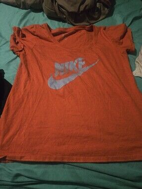 Nike Women’s Bright Orange Scoop Neck Tee with White Logo